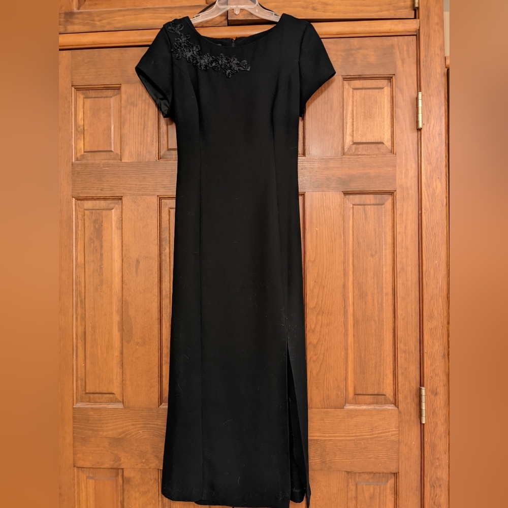 Long black dress with small side slit